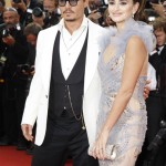 Penelope Cruz with Johnny Depp at the Pirates of the Caribbean official screening carrying the 'Power' bag